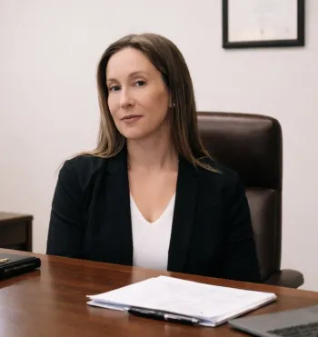 Liz at her desk